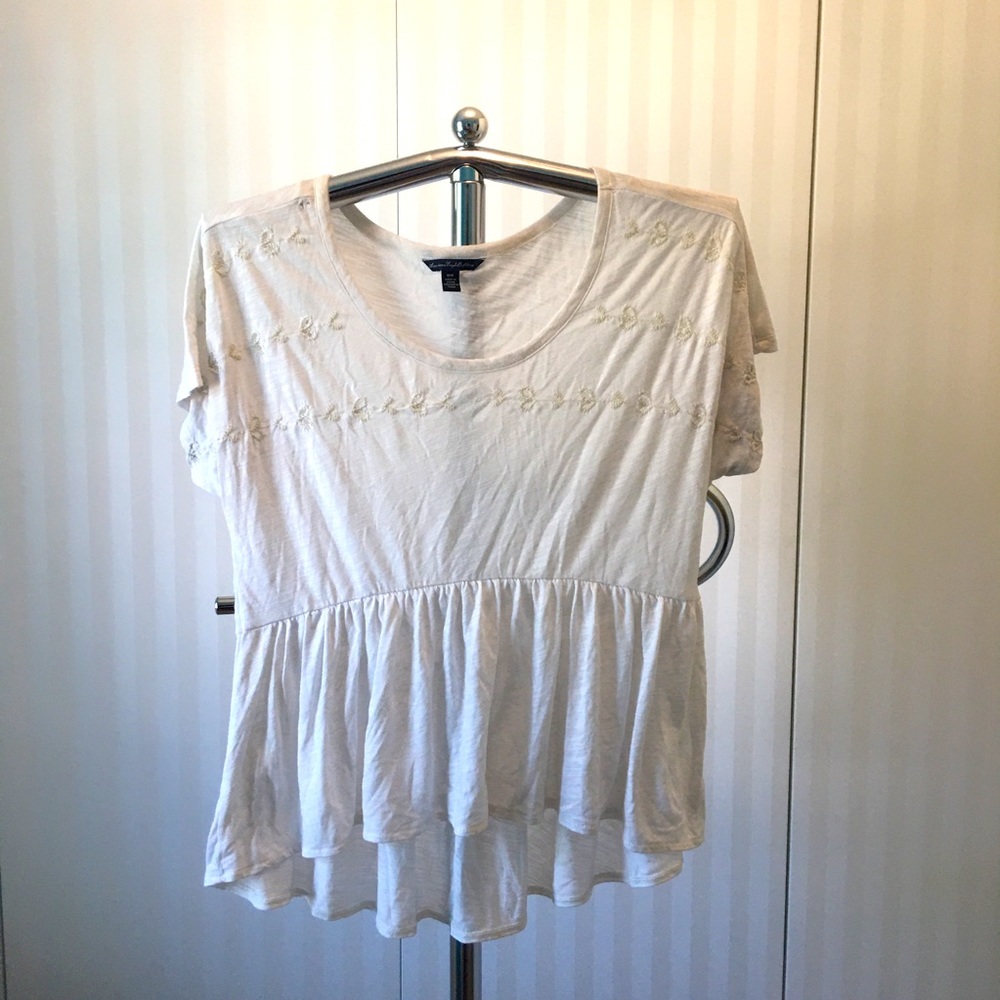American Eagle white peplum top (flaw at shoulder) Size M